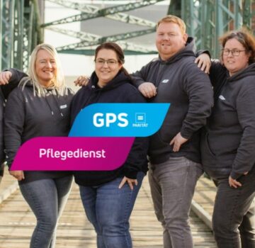 GPS Pflegedienst Teamfoto auf Brücke in Wilhelmshaven.
